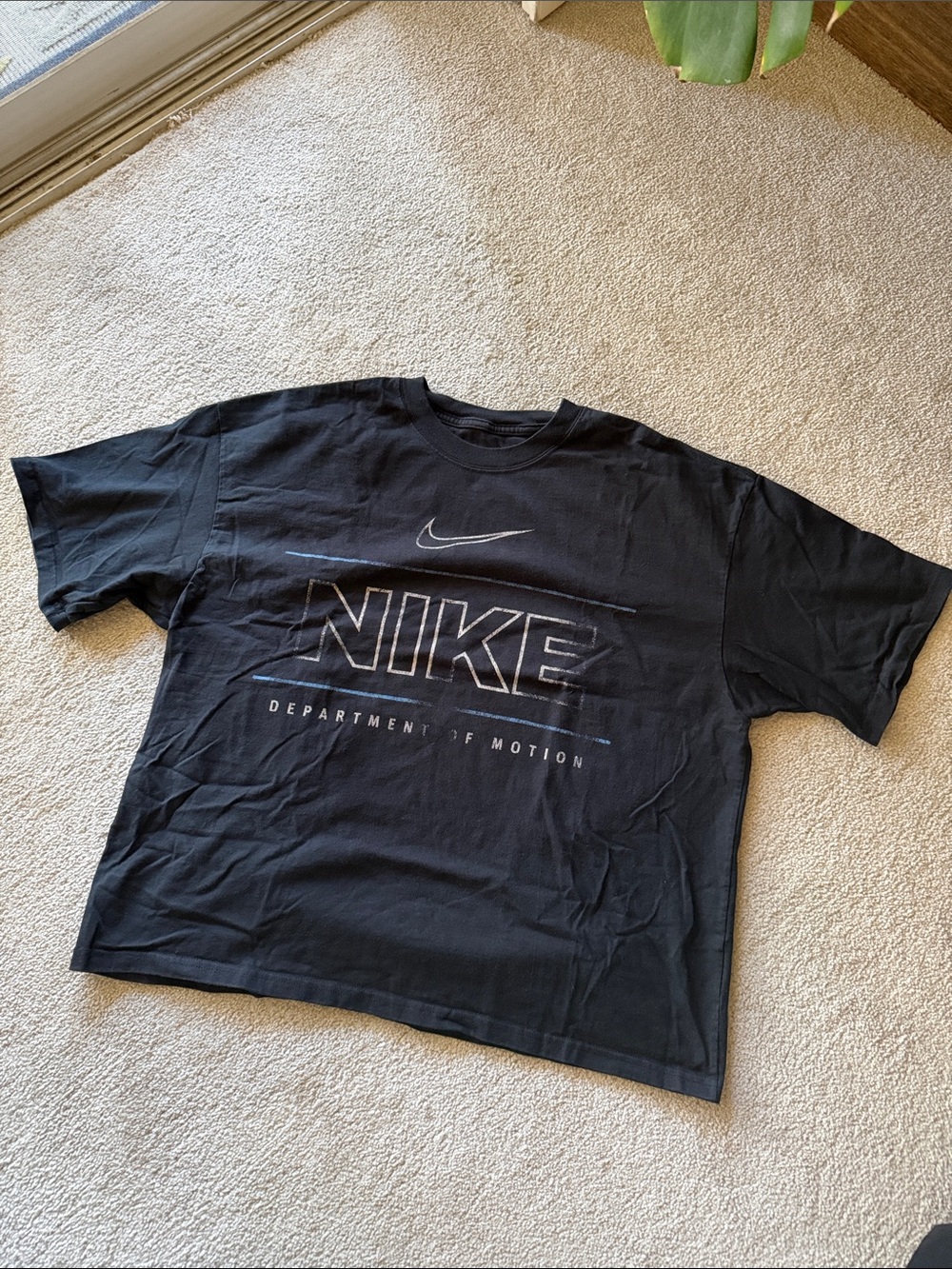 Nike Black Short-Sleeve Logo Tee with Subtle Blue Accents